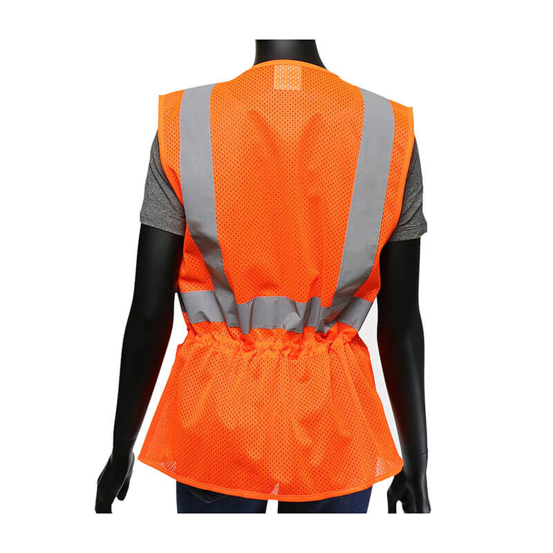 A mannequin displays the PIP ANSI Type R Class 2 Woman's Contoured Mesh Vest by Protective Industrial Products, highlighting its vibrant orange color and silver reflective tape on the back for improved visibility. The vest is layered over a gray shirt and has an elastic waistband for a snug fit, making it ideal hi-visibility apparel.