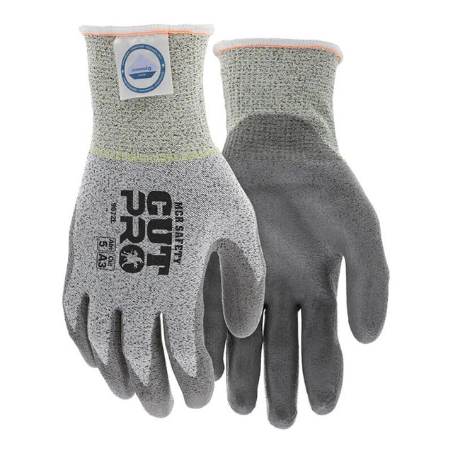 A pair of grey MCR Safety cut-resistant gloves with the model name "Memphis Diamond Tech PU Dyneema 9672," featuring protection level A3, is adorned with a textured surface and a wrist cuff displaying a blue logo. These gloves, enhanced for abrasion resistance, are displayed overlapping each other.