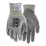 A pair of gray and white MCR Safety Memphis Dyneema Ultra-Tech Glove 9676 cut resistant gloves with safety ratings on the back, textured palms, and reinforced cuffs for protection—ideal for assembly work.