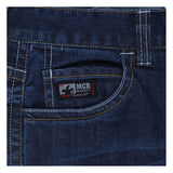Close-up of MCR Safety FR Gear 10.5 oz Vintage Denim Jeans P2D, focusing on the front pocket with a black "MCR SAFETY" label and white stitching, highlighting durable flame resistant CAT2 protection.