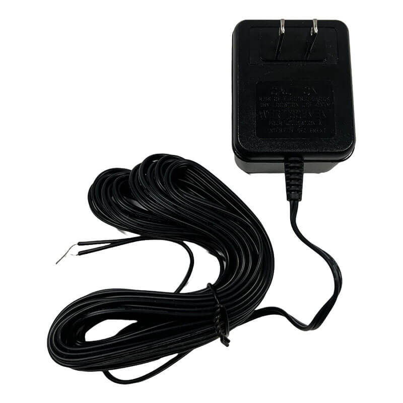The RKI Instruments Indoor Stand Alone Monitor 24VDC AC Adapter (49-2005RK-01) delivers reliable 24VDC power for gas detection systems, with a long coiled cable and two exposed wires for easy connection to standard outlets.