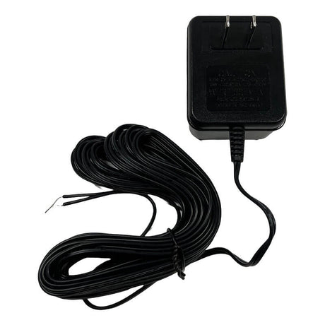 The RKI Instruments Indoor Stand Alone Monitor 24VDC AC Adapter (49-2005RK-01) delivers reliable 24VDC power for gas detection systems, with a long coiled cable and two exposed wires for easy connection to standard outlets.