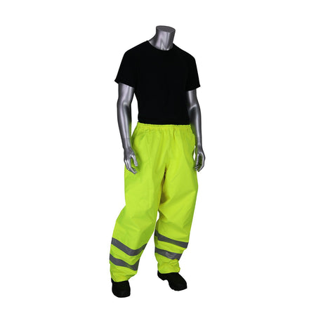 A mannequin displays ANSI Class E hi-visibility apparel, featuring PIP VizPLUS Waterproof Breathable Pants (353-2002) in yellow with reflective stripes and a black t-shirt, set against a plain white background.