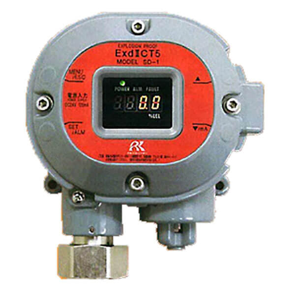 A round, gray industrial device from RKI Instruments, labeled "Explosion Proof," features a display screen showing numbers. The model is the RKI SD-1GP CH4 LEL Detector with HART communication capabilities and functions as a methane detector. Additional controls and connectors are situated at the bottom.