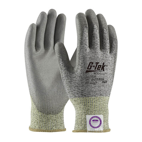 A pair of gray PIP G-Tek ECO Dyneema Phoenix gloves with textured palms and a polyurethane-coated grip for enhanced hold. These Dyneema-blended gloves feature a knit wrist cuff in contrasting light green, providing cut resistance, and display product information and logos on the back of the hands.