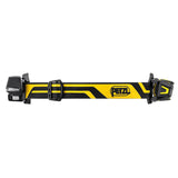 Featuring the Petzl XENA Rechargeable Headlamp E004BA00, this headlamp boasts a sleek design in black and yellow with the Petzl logo on its adjustable strap. Tailored for industrial professionals, it is equipped with a compact light unit and buckle adjustments on each side.