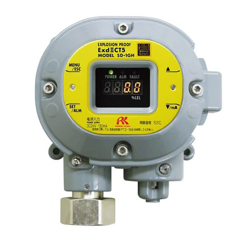 A RKI Instruments SD-1GH C4H10 Detector, featuring a digital display and multiple buttons, is mounted on a gray, circular base. This explosion-proof device with a yellow label includes various connectors and industry-specific text, seamlessly integrating with the 4-20 mA transmitter systems for enhanced safety monitoring.