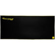 The black rectangular "ErgoKneel Extreme Standing Mat" by Working Concepts, labeled with yellow text and details along the edges, boasts a simple, modern design perfect as an anti-fatigue mat for standing work areas.