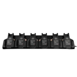 A WatchGas SST 6 Way Bench Top Charger (SST-6WSCC-KIT) holds six identical battery packs labeled “WatchGas” in a row. This centralized charging dock from WatchGas offers efficient six-device charging for streamlined power management, neatly arranged against a white background.
