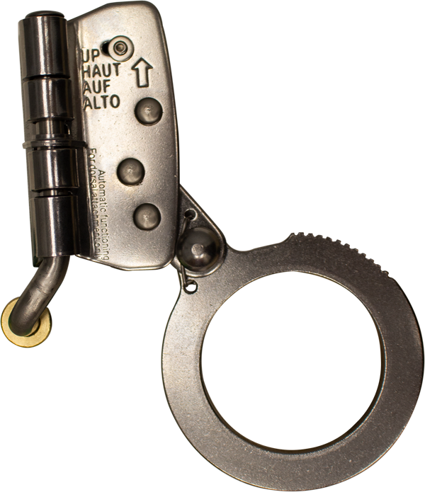 A close-up image of a single metallic handcuff, open to reveal its locking mechanism. The polished metal is reflective, with "UP" and "HAUT" engraved near the hinge, reminiscent of the precision seen in the French Creek Stainless Steel Rope Grab with Safety Lock 1201N by French Creek Production used for fall protection.