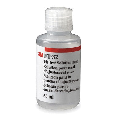 A compact see-through plastic bottle with a white cap is labeled "3M FT-32 Bitter Fit Test Solution" in various languages, making it suitable for OSHA fit tests. The label shows a volume of 55 ml, which is ideal for checking the seal of respirator equipment.