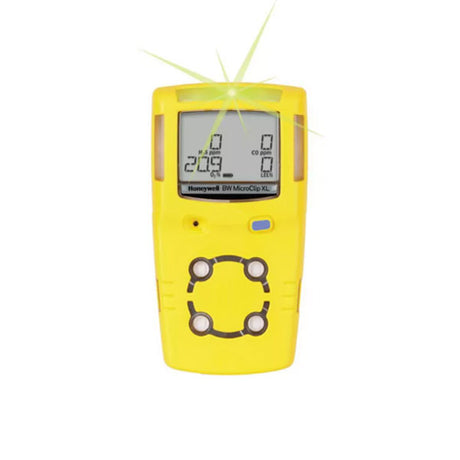 The BW Honeywell GasAlert MicroClip XL Multi-Gas Monitor, model MCXL-XWHM-Y-NA, is a yellow gas monitor designed for industrial work sites. It features a digital display for monitoring gas levels and includes a bright indicator light on top with four sensor ports on the front to ensure safety at a glance.