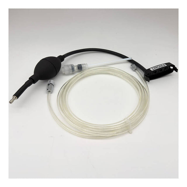 The RKI Instruments GX-3R Pro Hand Aspirated Sample Adapter (81-1162) features clear tubing with connectors, a black squeeze bulb, and a compact black control unit—ideal for medical or laboratory applications such as gas detector sample adapter use or confined space gas sampling. The coiled assembly is neatly arranged in a circle and displayed on a white background.