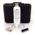A silver gas cylinder labeled "Calibration Gas" is positioned in front of a black protective case, accompanied by a pressure regulator with gauge, clear tubing, and a black bracket. These components make up the RKI Instruments Manual Calibration Kit for GX-2009 Monitor from PK Safety Supply, an essential set for calibrating gas monitors.