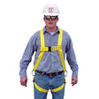 A man wearing a white hard hat, sunglasses, and a blue shirt is equipped with the French Creek Lightweight Full Body Harness, Hip D-rings 631B. Showcasing effective fall protection by French Creek Production, he stands against a white background, looking straight ahead.