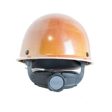 A natural tan MSA Skullgard Hard Cap (model 475395) with a black adjustable Fas-Trac suspension, featuring a front view. The interior includes a circular adjustment knob for size fitting and is crafted to efficiently withstand radiant heat loads.