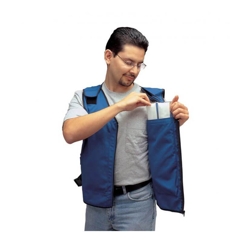 Wearing glasses and standing against a plain white background, a person dressed in a gray t-shirt and blue jeans slips an Allegro Cooling Standard Vest for Cooling Insert 8413 into their blue cooling vest, looking ready for action.