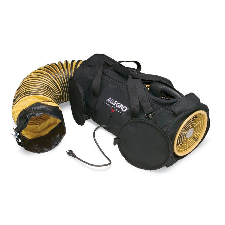 The Allegro 9535 Air Bag All-in-One Ventilation System is an efficient setup featuring a black and yellow industrial ventilator with a flexible ducting hose. The blower comes in a black carry case labeled "Allegro," and the fan unit includes an electric plug for easy operation.