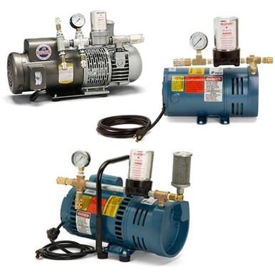 Displayed are three Allegro Ambient Air Pumps, each equipped with a gauge and multiple warning labels. The pumps feature metallic and blue bodies, along with attached black power cords. They are arranged against a plain white background, making them an ideal match for your airline respirator setup.