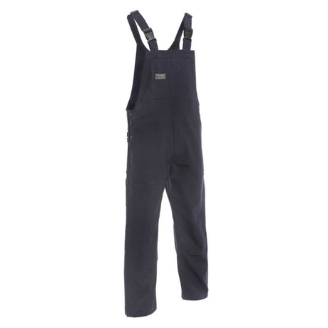 A pair of navy FR bib overalls with adjustable straps and a small logo on the chest, displayed on a white background. The NSA DRIFIRE FR Deluxe Insulated Bib features side pockets and reinforcing seams at the knees for enhanced durability.