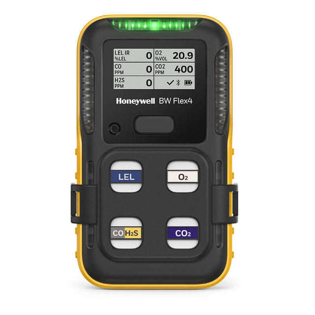 The Honeywell BW Flex4 4-Gas Detector by BW Technologies features a yellow and black casing, four labeled buttons (LEL, O₂, CO/H₂S, CO₂), and a screen showing gas concentration readings. It’s portable for easy monitoring.