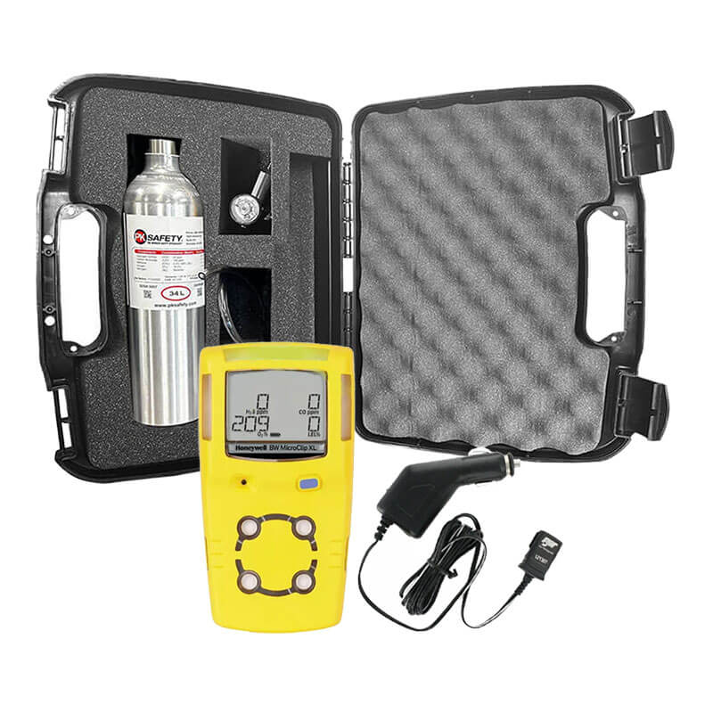 The PK Safety BW GasAlert MicroClip XL Confined Space Kit includes a yellow 4-gas monitor, metal calibration cylinder, charger, cables, and accessories, all housed in a black foam-lined carrying case for confined space safety.