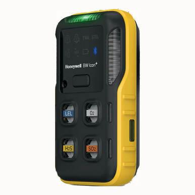 The BW Honeywell Honeywell BW Icon+ Multi-Gas Detector is a compact handheld device in black and yellow. It includes a small screen and four buttons labeled LEL, O₂, H₂S, and SO₂ for various gas sensors. A green light bar at the top enhances its reliability as an effective multi-gas detector.