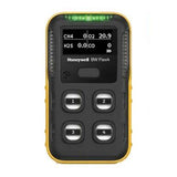 A BW Honeywell BW Flex4 4-Gas Detector, featuring a yellow casing and black front panel, showcases a digital screen that displays gas levels, four sensors numbered 1 to 4, and proudly bears the iconic Honeywell logo.