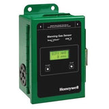 The Honeywell Analytics Manning EC-FX Ammonia Gas Sensor (100ppm) ECFX-100, featuring a green digital display that shows "ECFX NH3 0 PPM," includes buttons labeled "Accept" and "Scroll," as well as various ports and mounting details. This makes it an essential component of any ammonia detection system.