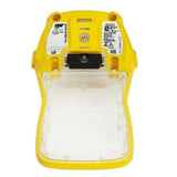 A handheld device, resembling a BW Honeywell replacement, is yellow with an open battery compartment. The interior of the BW Honeywell Quattro Replacement Back Enclosure mostly consists of clear plastic, and labels and specifications are visible on the top section.