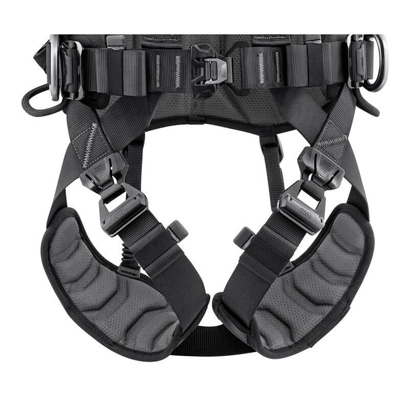 Close-up of the Petzl Volt International Version Harness (C072CB0_) by Petzl in black and gray, featuring adjustable straps, metal buckles, and reinforced stitching—ideal for tower work or use as a fall-arrest harness.