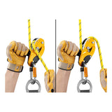 Two gloved hands use the Petzl RIG Compact Descender D021_ _00, attached to a climbing rope and carabiner, showing its operation in two different positions.