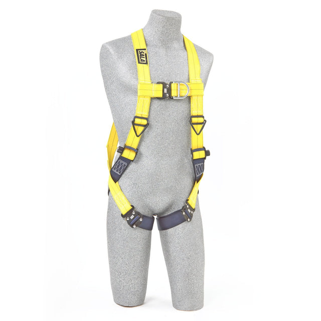 A gray mannequin showcases a bright yellow 3M DBI-SALA Delta Vest Positioning Safety Harness, featuring black straps and corrosion-resistant hardware. The safety harness is secured around the model's torso and legs, boasting a central ring for reliable attachments.