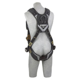 A grey mannequin displays a black 3M DBI-SALA ExoFit NEX Comfort Arc Flash Vest Safety Harness by 3M DBI-SALA Fall Protection, featuring adjustable shoulder, chest, and leg straps with metal buckles. This premium harness includes yellow accents and a back D-ring for fall protection, ensuring top-notch security in demanding conditions.