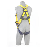 A gray mannequin is showcasing a 3M DBI-SALA Delta Vest-Style Harness in yellow and black. This safety harness, featuring a no-tangle design, includes adjustable straps and corrosion-resistant hardware, along with a metal ring on the back for fall protection.