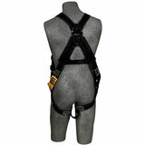 A mannequin is showcasing the 3M DBI-SALA Fall Protection Delta Back D-Ring Non-Conductive Welder’s Harness, model 1105475. This black harness, made with Nomex/Kevlar and featuring adjustable straps, is displayed against a plain background. Its flame-resistant design and structure are accentuated by a distinctive yellow label.