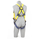 A gray mannequin is wearing the 3M DBI-SALA Delta Vest Safety Harness with a tongue buckle, in a vibrant yellow and blue color scheme. The harness features corrosion-resistant hardware and adjustable straps, along with a back attachment point. Its no-tangle design ensures ease of use, making it an excellent choice for personal fall arrest systems.