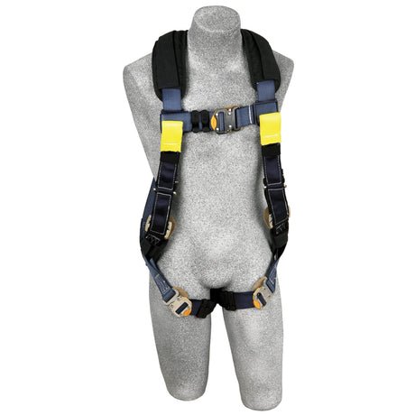 The 3M DBI-SALA ExoFit XP Comfort Arc Flash Web Loop Rescue Harness, showcased on a gray mannequin torso, integrates comfort padding with blue and black design elements. With yellow highlights, adjustable straps, and sturdy metal buckles, this product from 3M DBI-SALA Fall Protection offers a secure fit and protection for any task.