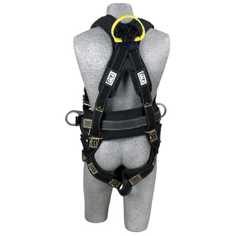 A gray mannequin showcases the 3M DBI-SALA ExoFit XP AF Construction Web Loop Positioning Harness from 3M DBI-SALA Fall Protection. This black harness, accented with yellow and silver highlights, features durable Nomex/Kevlar webbing and a prominent yellow ring on the back for added safety and comfort.