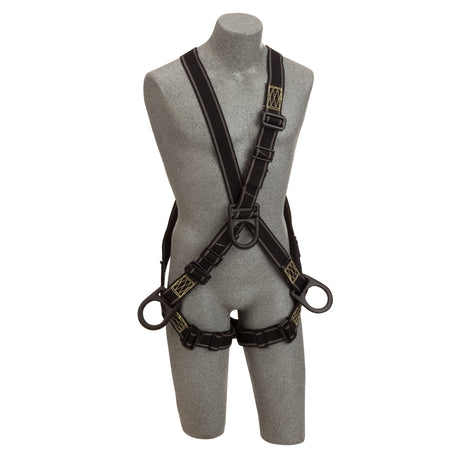 A DBI-SALA Delta Arc Flash Cross-Over Climbing/Positioning Harness by 3M DBI-SALA Fall Protection on a gray mannequin torso. The harness features adjustable straps, metal buckles, and reinforced stitching, designed to secure and support the wearer during activities such as climbing or construction work.