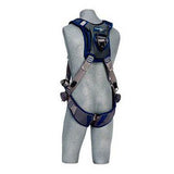 A gray mannequin displays the 3M DBI-SALA ExoFit STRATA Vest-Style Harness 111247_, equipped with PolarMesh padding for increased comfort. This ergonomic harness from 3M DBI-SALA Fall Protection includes adjustable shoulder, waist, and leg straps with secure buckles. A large circular ring on the back facilitates easy attachments.