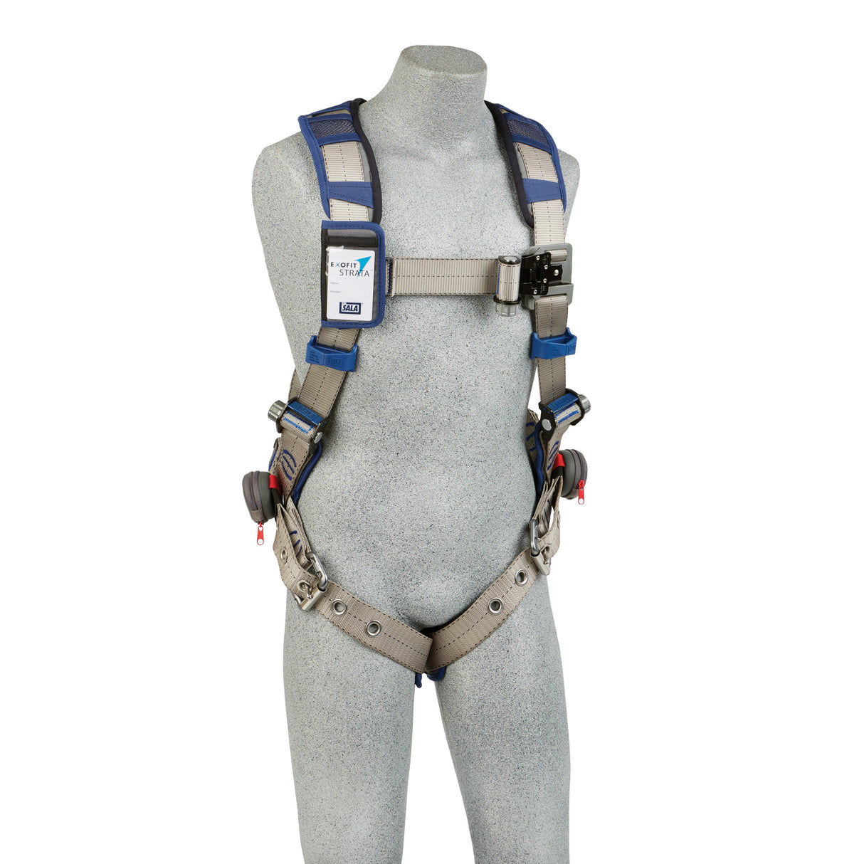 A gray mannequin showcases the 3M DBI-SALA ExoFit STRATA Comfort Vest Harness from 3M DBI-SALA Fall Protection, complete with blue and gray straps, metal clips, buckles, and a front label. The headless and armless form highlights fall protection features like the breathable mesh design for enhanced comfort.