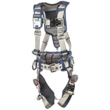 The DBI-SALA ExoFit STRATA Construction Positioning Harness, Tri-Lock by 3M DBI-SALA Fall Protection provides fall protection with padded shoulder, back, and leg straps. It includes metal buckles, adjustable straps, and a D-ring at the back for secure attachment. The harness features a sleek gray and blue design.