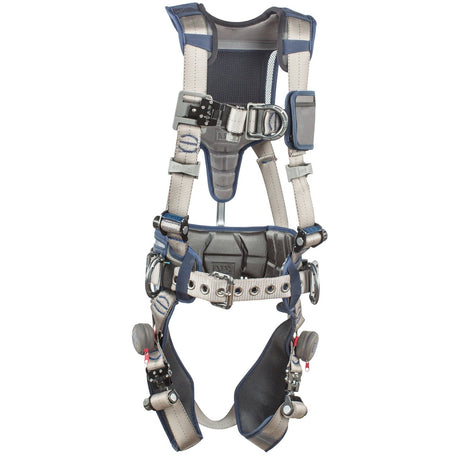 The DBI-SALA ExoFit STRATA Construction Positioning/Climbing Harness by 3M DBI-SALA Fall Protection is equipped with adjustable straps, metal buckles and rings, and padded areas for enhanced comfort. It features reinforced back support and an integrated weight distribution system, making it expertly designed for fall protection in industrial or construction environments.