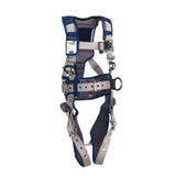 Set against a white background is the DBI-SALA ExoFit STRATA Construction Positioning Harness in blue and gray from 3M DBI-SALA Fall Protection. It includes adjustable straps and metal buckles. The harness is designed with padded areas for comfort, features a weight distribution system for balanced support, and has a label with specifications on the upper section.