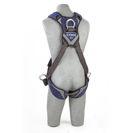 A gray mannequin showcases the 3M DBI-SALA Fall Protection ExoFit NEX Cross-Over Positioning/Climbing Harness in blue and black, designed with comfort padding for improved wearability. The harness includes secure straps and metal D-rings to ensure both safety and protection.