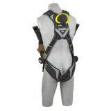 A gray mannequin displays the DBI-SALA ExoFit NEX Comfort Arc Flash Rescue Safety Harness by 3M DBI-SALA Fall Protection, featuring comfort padding. The black safety harness is adorned with yellow accents, padded shoulder straps, a waist belt, and a prominent yellow D-ring on the back to ensure maximum fall protection.