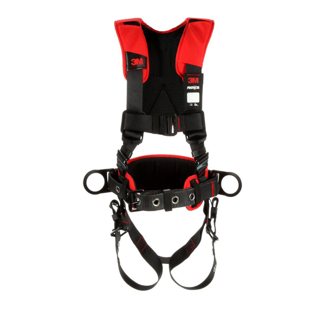 A 3M DBI-SALA Protecta Comfort Construction Positioning Harness in red and black, featuring pass-through buckles and adjustable straps, designed for fall protection in industrial or construction environments. The brand logo is prominently displayed on the chest and waist padding, signifying its status as a reliable top-tier safety harness.