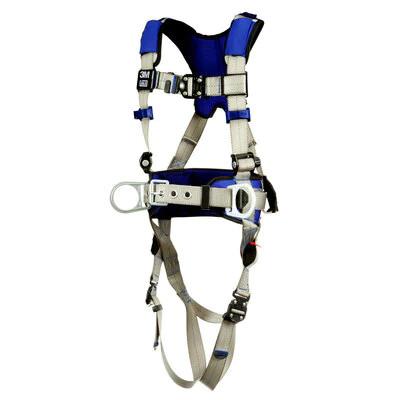 The 3M DBI-SALA ExoFit X100 Comfort Construction Positioning Harness 140109, offered by 3M DBI-SALA Fall Protection, is a blue and gray safety harness featuring comfort padding, adjustable straps, buckles, and a metal D-ring attachment for personal fall protection. Ideal for construction positioning, the harness is shown suspended upright against a plain white background.