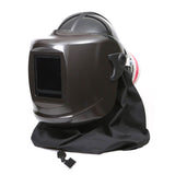The Pureflo ESM+ PF60 PAPR Welding Helmet (PR05801-_-1_1) is a black helmet with a rectangular viewing window and protective bottom fabric, designed for head and neck protection during welding and compatible with powered air purifying respirators.